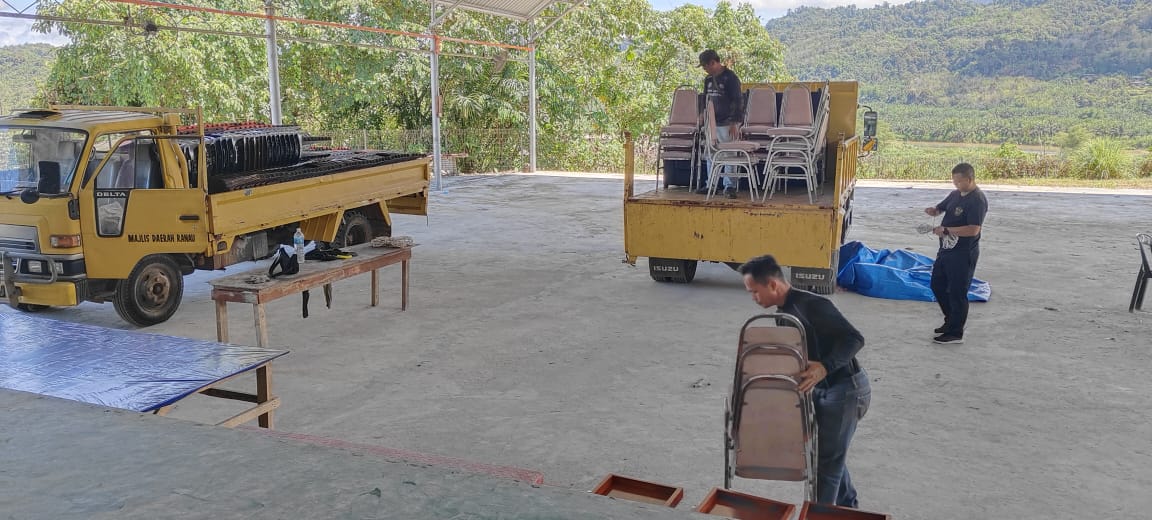 May be an image of 3 people, service vehicle and text