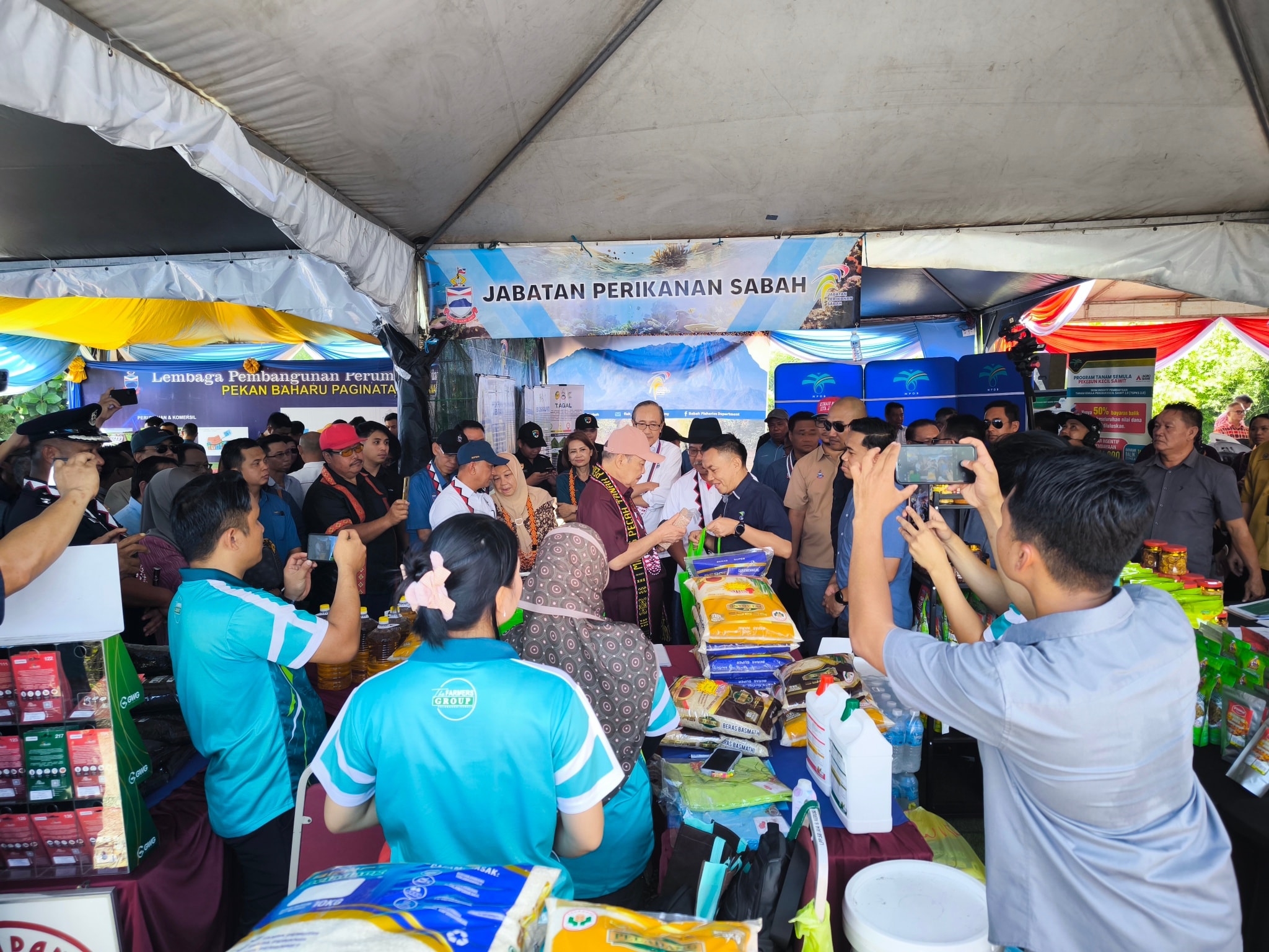 May be an image of 2 people, crowd and text