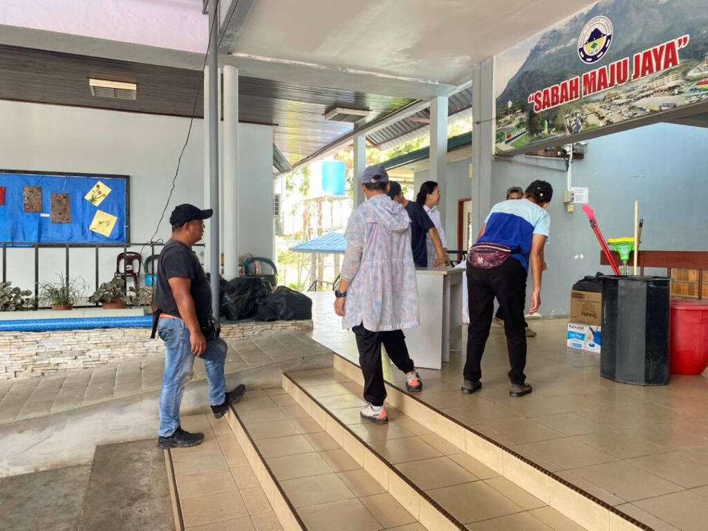 May be an image of one or more people and text