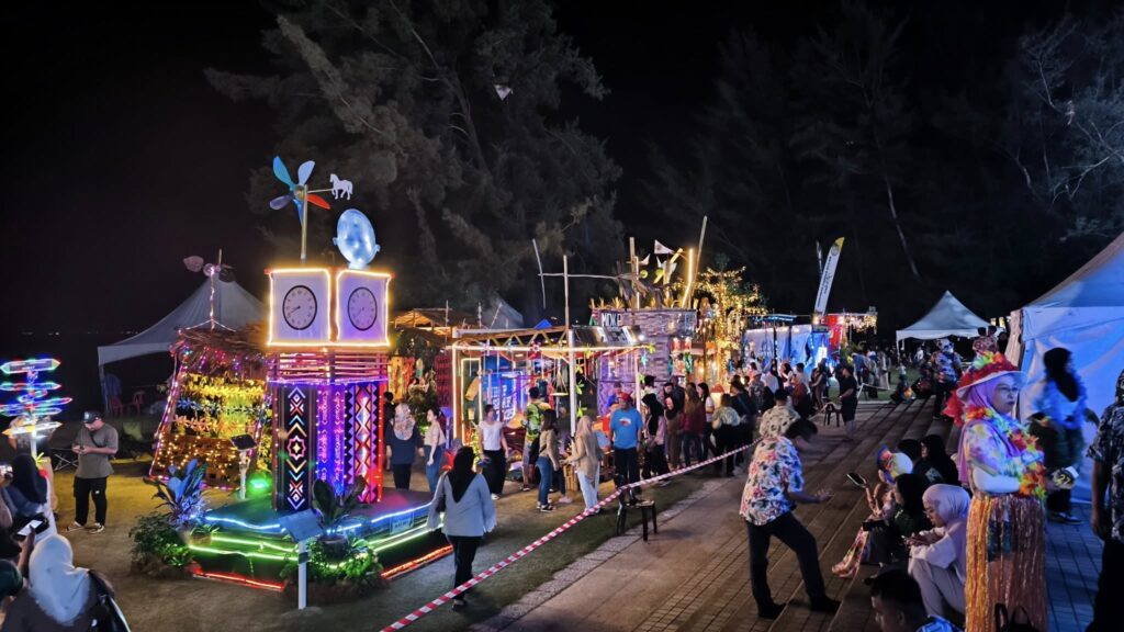 May be an image of lighting and crowd